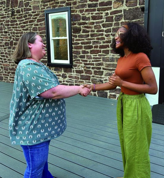  Just the beginning…Shaking hands goodbye, Souderton Connects Manager Jessica Cimini and sophomore Condoleezza Oyesola leave their first meeting for the 3rd Friday mentorships. 