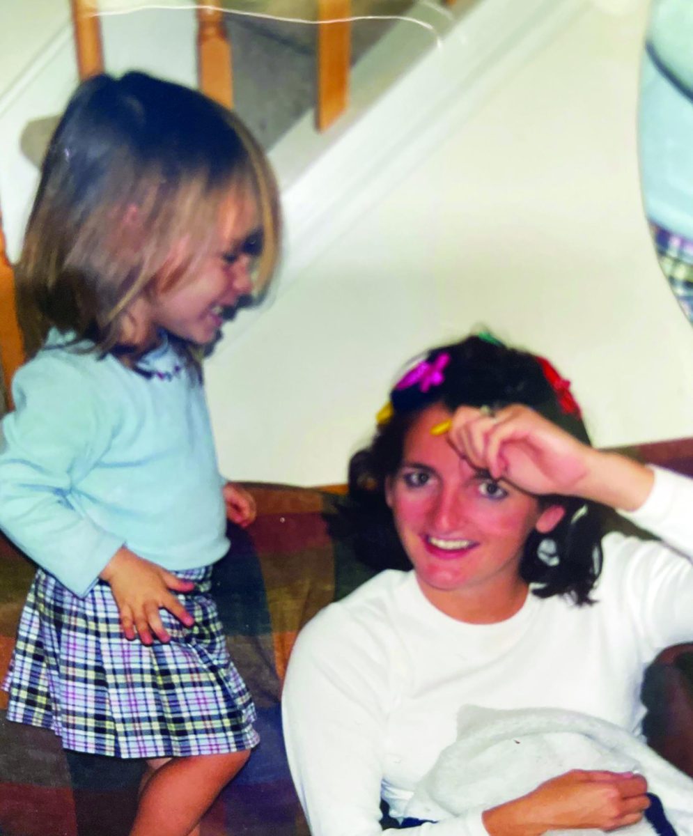 Bonded…Spending quality time together, then 3-year-old Melissa Kling smiles with her mother, Beth, at her childhood home. Kling currently teaches science at the high school. 