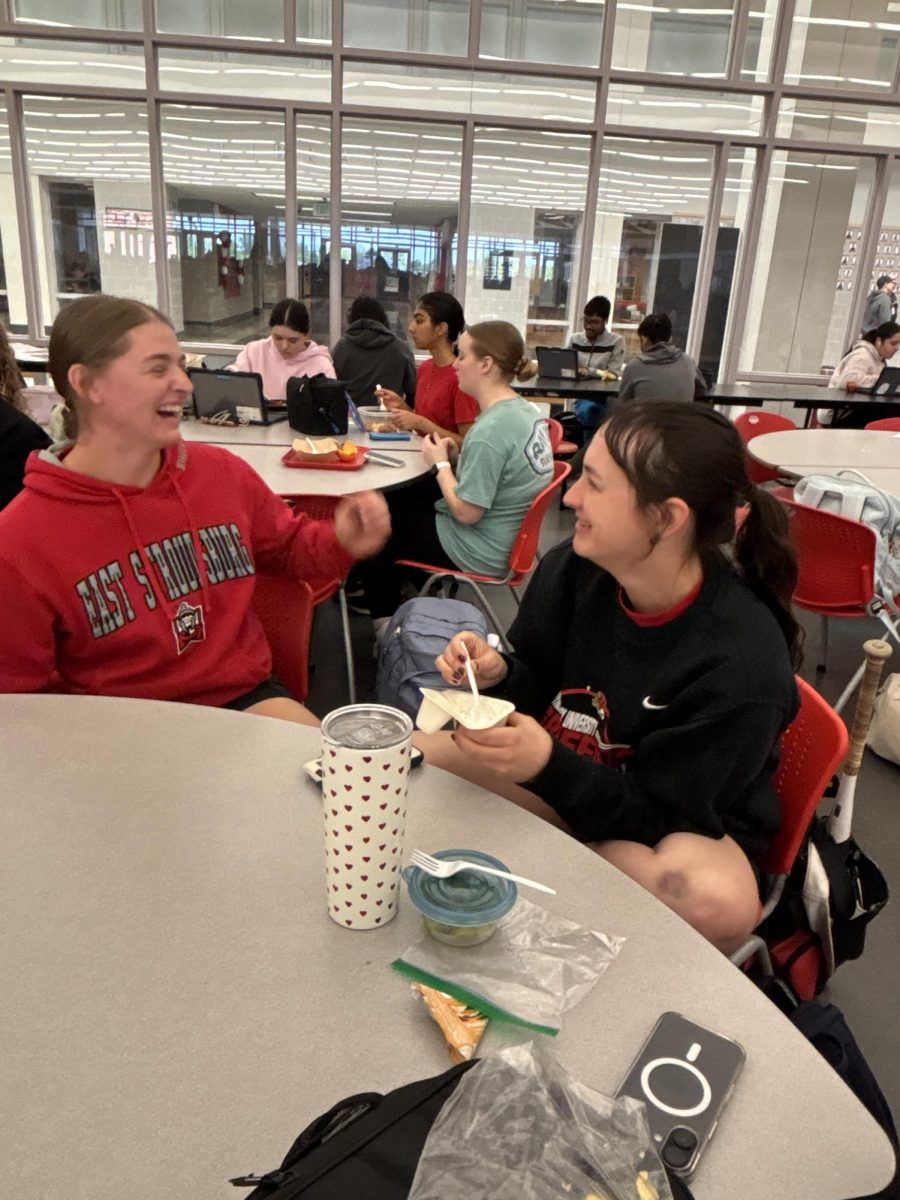 Glory days…Reflecting on their time at Souderton, seniors Kathryn Jones (left) and Izzy Shurtz reminisce during lunch about their favorite high school memories. National Decision Day took place on May 1.