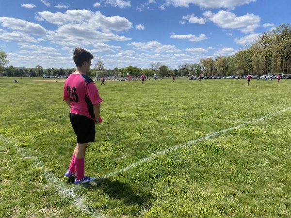 Waiting around… Preparing for the kickoff, junior Chase Snyder gets ready to start the second half of a spring game against South Parkland on May 3. The game resulted in a 2-2 tie.